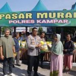 GRIB Jaya DPC Riau Bersama Polres Kampar Gelar Pasar Murah, Distribusikan 4 Ton Beras untuk Warga